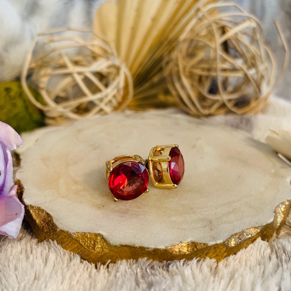 Large red studs